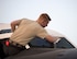 U.S Air Force Airman 1st Class Jacob Schwartz, a crew chief with the 763th Expeditionary Aircraft Maintenance Unit, cleans the windows on RC-135V/W Rivet Joint at Al Udeid Air Base, Qatar, July 4, 2017. Schwartz is responsible for keeping the RC-135V/W Rivet Joint operational so it can provide near real time on-scene intelligence collection and analysis throughout the U.S. Air Forces Central Command area of responsibility. (U.S. Air Force photo by Tech. Sgt. Amy M. Lovgren)