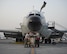 U.S Air Force Airmen with the 763th Expeditionary Aircraft Maintenance Unit, review a RC-135V/W Rivet Joint paper work at Al Udeid Air Base, Qatar, July 4, 2017.  The Airmen are responsible for keeping the RC-135V/W Rivet Joint operational so it can provide near real time on-scene intelligence collection and analysis throughout the U.S. Air Forces Central Command area of responsibility. (U.S. Air Force photo by Tech. Sgt. Amy M. Lovgren)