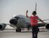 U.S Air Force Airman 1st Class David Boggs, a crew chief with the 763th Expeditionary Aircraft Maintenance Unit, marshals a RC-135V/W Rivet Joint for take-off at Al Udeid Air Base, Qatar, July 4, 2017.  Boggs is responsible for keeping the to the RC-135V/W Rivet Joint operational so it can provide near real time on-scene intelligence collection and analysis throughout the U.S. Air Forces Central Command area of responsibility. (U.S. Air Force photo by Tech. Sgt. Amy M. Lovgren)