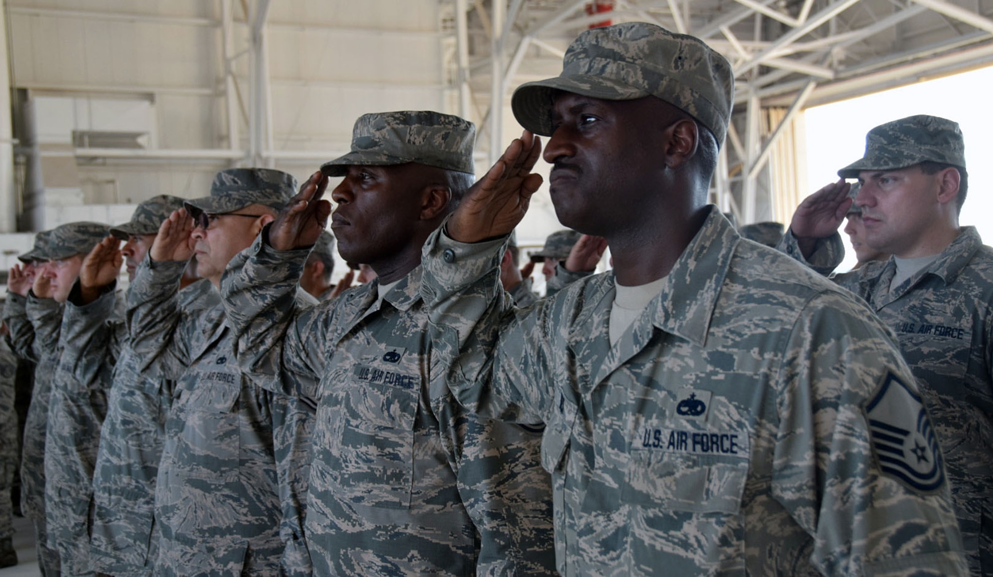 Members of the 433rd Maintenance Group render a salute during the assumption of command ceremony for their new group commander, Lt. Col. Charles V. Pratt at Joint Base San Antonio-Lackland July 15, 2017. Pratt’s precious assignment was as deputy group commander and maintenance squadron commander at Moffett Air Field, California. (U.S. Air Force photo/Tech Sgt. Carlos J. Trevino)