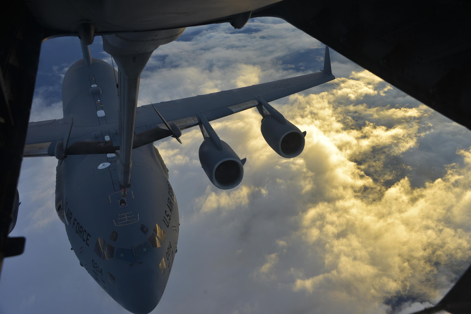 A KC-10 Extender from Travis Air Force Base, California, refuels a C-17 Globemaster III over the Pacific during Exercise Ultimate Reach July 13, 2017. During the operation, three KC-10s from Travis AFB and Joint Base McGuire-Dix-Lakehurst, New Jersey, refueled five C-17s carrying more than 300 coalition paratroopers. The C-17s went on to conduct a strategic air drop over Australia in support of Exercise Talisman Saber 2017. (U.S. Air Force photo by 2nd Lt. Sarah Johnson)
