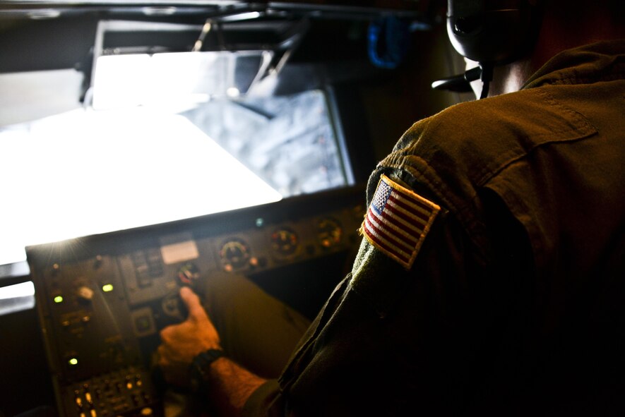 U.S. Air Force Tech. Sgt. Daniel Flenniken, 6th Air Refueling Squadron boom operator at Travis Air Force Base, California, refuels a C-17 Globemaster III over the Pacific during Exercise Ultimate Reach July 13, 2017. During the operation, three KC-10s from Travis AFB and Joint Base McGuire-Dix-Lakehurst, New Jersey, refueled five C-17s carrying more than 300 coalition paratroopers. The C-17s went on to conduct a strategic air drop over Australia in support of Exercise Talisman Saber 2017. (U.S. Air Force photo by 2nd Lt. Sarah Johnson)