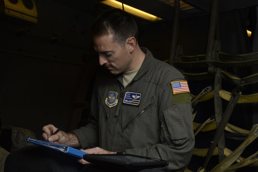 U.S. Air Force Tech. Sgt. Daniel Flenniken, 6th Air Refueling Squadron boom operator, conducts pre-flight checks on a KC-10 Extender at Joint Base Pearl Harbor-Hickam, Hawaii July 11, 2017 in preparation for travel to Wake Island. A combined crew from the 6th and 9th ARS at Travis Air Force Base supported Exercise Talisman Saber 2017 by executing Exercise Ultimate Reach, a strategic refueling and airdrop mission in which three KC-10s refueled five C-17 Globemaster IIIs carrying U.S. Army, Australian and Canadian paratroopers prior to an airdrop. TS 17 is a biennial exercise in Australia that focuses on bilateral military training between U.S. Pacific Command forces and the Australian Defence Force to improve U.S.-Australia combat readiness, increase interoperability, maximize combined training opportunities and conduct maritime prepositioning and logistics operations in the Pacific. (U.S. Air Force photo by 2nd Lt. Sarah Johnson)