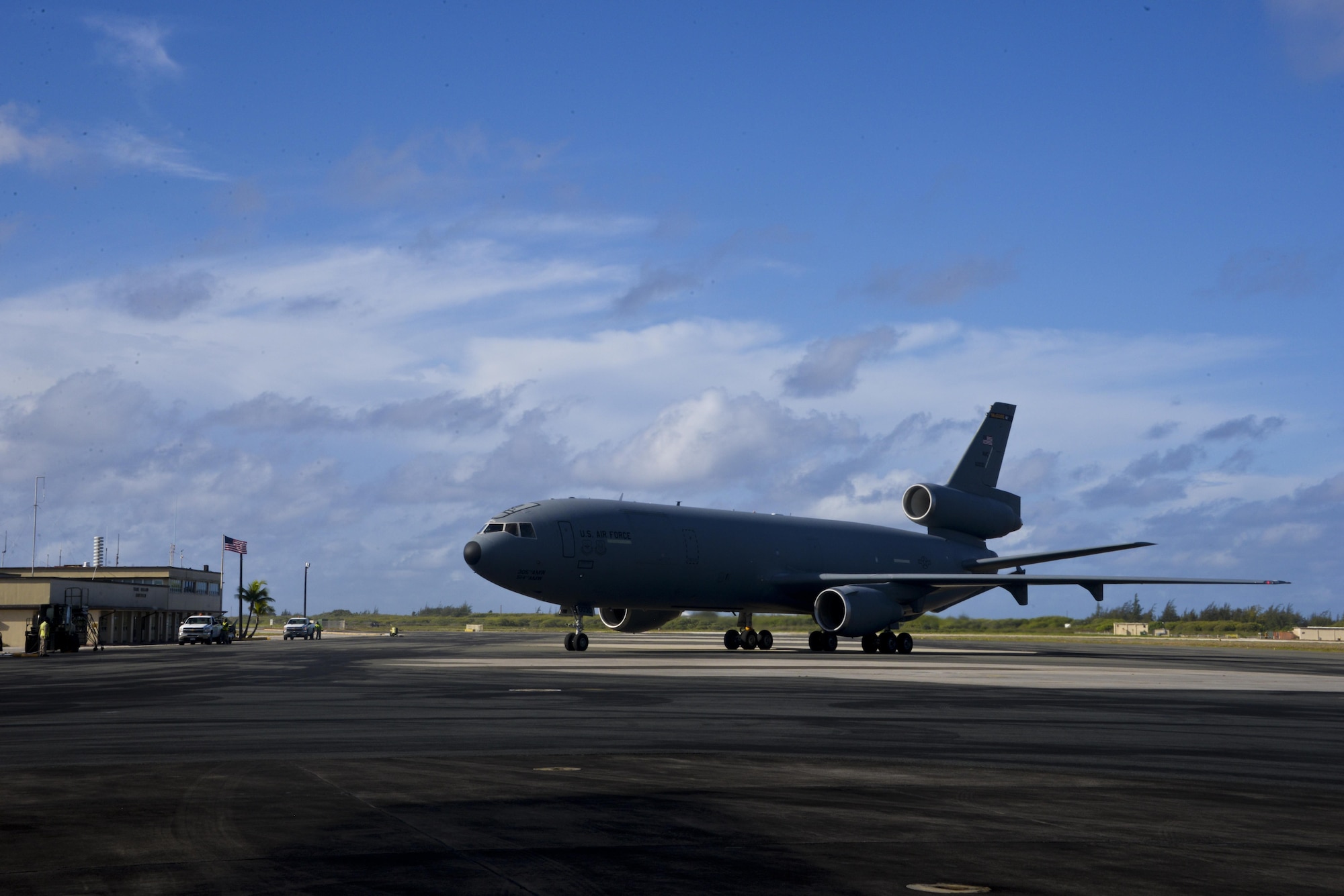 A KC-10 Extender taxis on the runway at Wake Island June 12, 2017. KC-10s from Travis Air Force Base, Calif., and Joint Base McGuire-Dix-Lakehurst, New Jersey, supported Exercise Talisman Saber 2017 by executing Exercise Ultimate Reach, a strategic refueling and airdrop mission in which three KC-10s refueled five C-17 Globemaster IIIs carrying U.S. Army, Australian and Canadian paratroopers prior to an airdrop. TS 17 is a biennial exercise in Australia that focuses on bilateral military training between U.S. Pacific Command forces and the Australian Defence Force to improve U.S.-Australia combat readiness, increase interoperability, maximize combined training opportunities and conduct maritime prepositioning and logistics operations in the Pacific. (U.S. Air Force photo by 2nd Lt. Sarah Johnson)