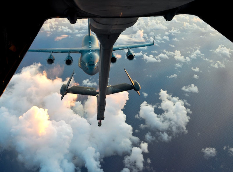 A KC-10 Extender from Travis Air Force Base, California, refuels a C-17 Globemaster III over the Pacific during Exercise Ultimate Reach July 13, 2017. During the operation, three KC-10s from Travis AFB and Joint Base McGuire-Dix-Lakehurst, New Jersey, refueled five C-17s carrying more than 300 coalition paratroopers. The C-17s went on to conduct a strategic air drop over Australia in support of Exercise Talisman Saber 2017. (U.S. Air Force photo by 2nd Lt. Sarah Johnson)