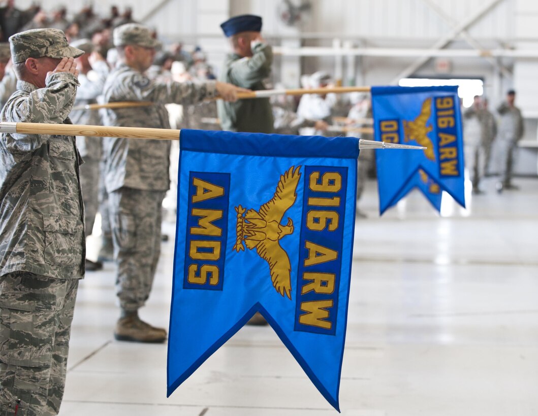 Members of the 916th Air Refueling Wing render salutes during a change of command ceremony at Seymour Johnson Air Force Base, N.C., July 15, 2017. During the ceremony, U.S. Air Force Col. Eric R. Jenkins relinquished command of the 916th ARW to Col. Scovill W. Currin. (U.S. Air Force photo by Senior Airman Kayla Newman)