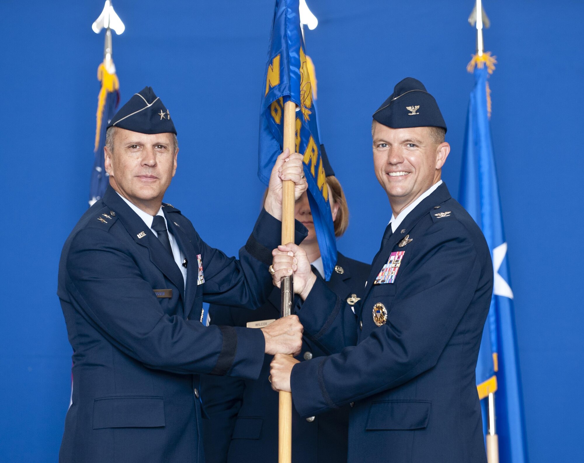 U.S. Air Force Col. Scovill W. Currin accepts command of the 916th Air Refueling Wing from U.S. Air Force Maj. Gen. Randall A. Ogden, 4th Air Force commander, during a change of command ceremony at Seymour Johnson Air Force Base, N.C., July 15, 2017.  Currin most recently served as the vice commander of the 916th ARW, and flies the KC-135R Stratotanker. (U.S. Air Force photo by Senior Airman Kayla Newman)