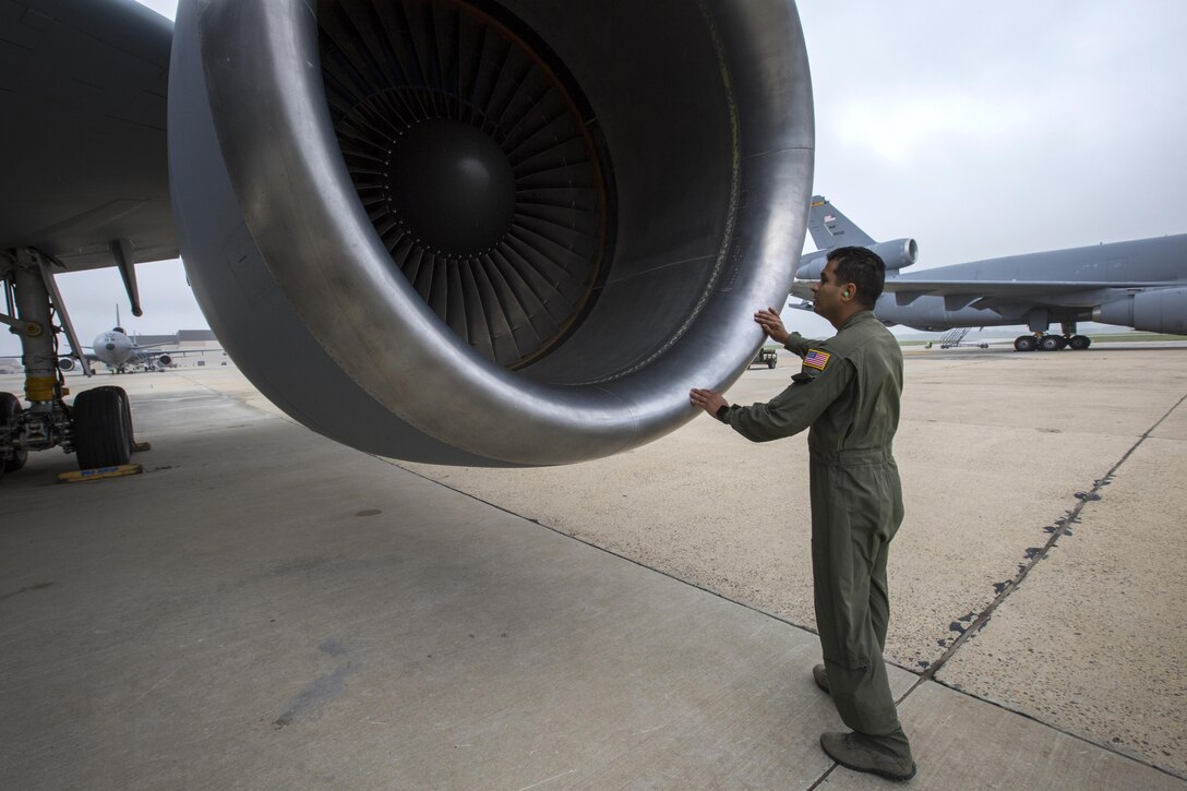U.S. Air Force Senior Airman Paul A. Perez engineer, 78th Air Refueling Squadron, 514th Air Mobility Wing, performs a pre-flight check on a KC-10 Extender at Joint Base McGuire-Dix-Lakehurst, N.J., prior to an aerial refueling mission over the Atlantic Ocean July 15, 2017. The KC-10 is an Air Mobility Command advanced tanker and cargo aircraft designed to provide increased global mobility for U.S. Armed Forces and is assigned to the 305th Air Mobility Wing and is maintained and flown by the 514th Air Mobility Wing, Air Force Reserve Command and the 305th. (U.S. Air Force photo by Master Sgt. Mark C. Olsen/Released)