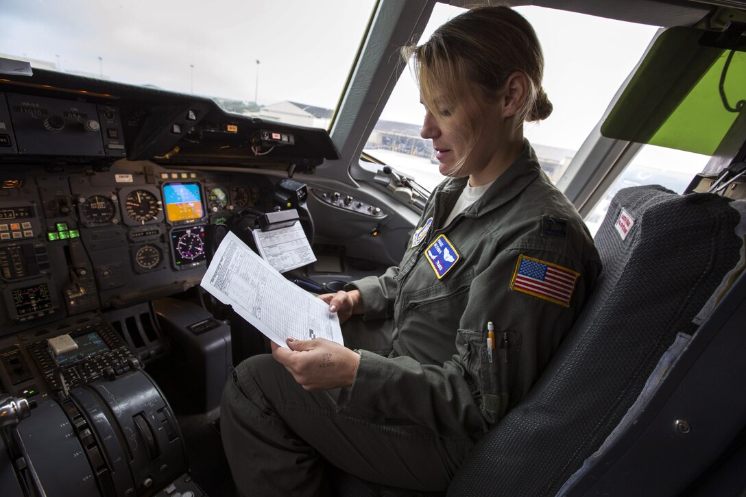 U.S. Air Force Capt. Paige H. Blevins,¬ 78th Air Refueling Squadron, 514th Air Mobility Wing, performs pre-flight check on a KC-10 Extender at Joint Base McGuire-Dix-Lakehurst, N.J., prior to an aerial refueling mission over the Atlantic Ocean July 15, 2017. The KC-10 is an Air Mobility Command advanced tanker and cargo aircraft designed to provide increased global mobility for U.S. Armed Forces and is assigned to the 305th Air Mobility Wing and is maintained and flown by the 514th Air Mobility Wing, Air Force Reserve Command and the 305th. (U.S. Air Force photo by Master Sgt. Mark C. Olsen/Released)