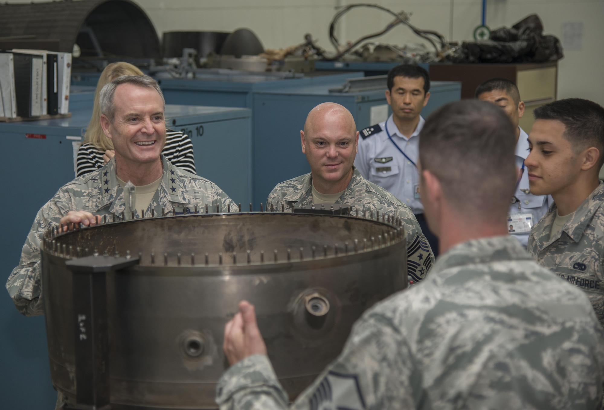 U.S. Air Force Lt. Gen. Darryl Roberson, commander, Air Education and Training Command, and AETC Command Chief Master Sgt. David Staton smile during a briefing at the 372nd Training Squadron, Detachment 23, Misawa Air Base, Japan, July 11, 2017. During the visit, the senior leaders were able to take a closer look at training to ensure continued support to 35th Fighter Wing maintainers. (U.S. Air Force photo by Senior Airman Brittany A. Chase)