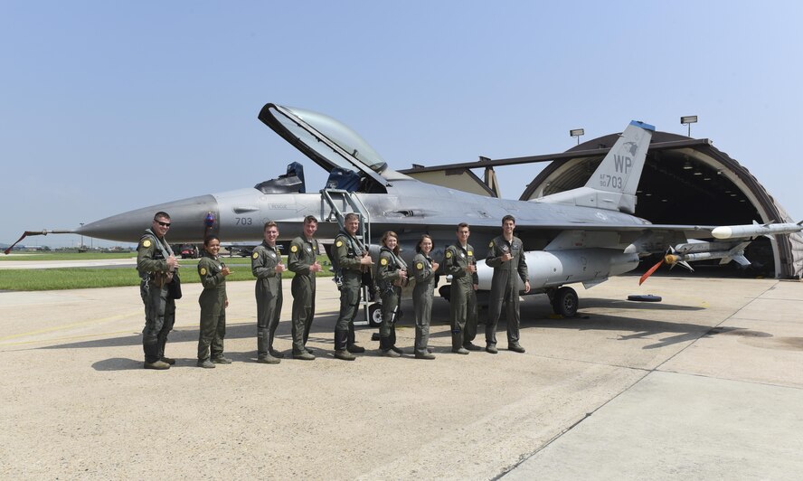 U.S. Air Force Col. David Shoemaker poses with U.S. Air Force Academy cadets at Kunsan Air Base, Republic of Korea, July 12, 2017. The visit was part of the Air Force Academy’s Operation Air Force a career immersion program. During the course of approximately two weeks between their sophomore and junior years, cadets from the Academy visit bases around the Air Force to develop their knowledge of jobs they can apply for and the Air Force writ large. (U.S. Air Force photo by Senior Airman Michael Hunsaker/Released)