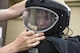 U.S. Air Force Academy Cadet 2nd Class Ryan Ramseyer tries on an explosive ordnance disposal suit at Kunsan Air Base, Republic of Korea, July 11, 2017. The visit allows cadets to travel different bases to learn about different careers and missions on the officer and enlisted tier and is a part of the Air Force Academy’s Operation Air Force program. (U.S. Air Force photo by Senior Airman Michael Hunsaker/Released)