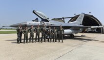 U.S. Air Force Col. David Shoemaker, 8th Fighter Wing commander, poses with U.S. Air Force Academy cadets at Kunsan Air Base, Republic of Korea, July 12, 2017. The visit was part of the Air Force Academy’s Operation Air Force career immersion program. During the course of approximately two weeks between their sophomore and junior years, cadets from the Academy visit bases around the Air Force to develop their knowledge of potential jobs they can apply for and the service writ large. (U.S. Air Force photo by Senior Airman Michael Hunsaker/Released)