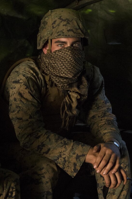 Lance Cpl. Michael Ruiz, a mechanic with Combat Logistics Battalion 31, sits inside a 7-ton truck before small-arms and machine gun marksmanship training on Townshend Island, Shoalwater Bay Training Area, Queensland, Australia, during Exercise Talisman Saber 17, July 16, 2017. Ruiz, 20, is a native of Riverside, California and graduate of Bueno High School. Marines with Combat Logistics Battalion 31 provide essential support to the Marines and Sailors of the 31st Marine Expeditionary Unit while supporting Talisman Saber 17. The 31st MEU is taking part in Talisman Saber 17 while deployed on a regularly-scheduled patrol of the Indo-Asia-Pacific region. Talisman Saber is a biennial exercise designed to improve the interoperability between Australian and U.S. forces. 