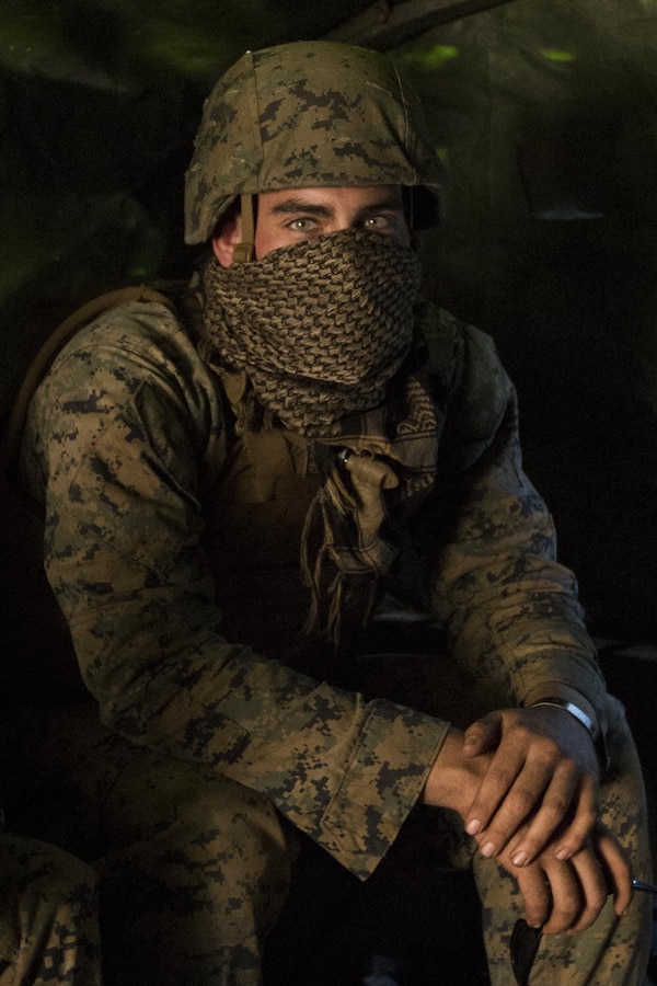Lance Cpl. Michael Ruiz, a mechanic with Combat Logistics Battalion 31, sits inside a 7-ton truck before small-arms and machine gun marksmanship training on Townshend Island, Shoalwater Bay Training Area, Queensland, Australia, during Exercise Talisman Saber 17, July 16, 2017. Ruiz, 20, is a native of Riverside, California and graduate of Bueno High School. Marines with Combat Logistics Battalion 31 provide essential support to the Marines and Sailors of the 31st Marine Expeditionary Unit while supporting Talisman Saber 17. The 31st MEU is taking part in Talisman Saber 17 while deployed on a regularly-scheduled patrol of the Indo-Asia-Pacific region. Talisman Saber is a biennial exercise designed to improve the interoperability between Australian and U.S. forces. 