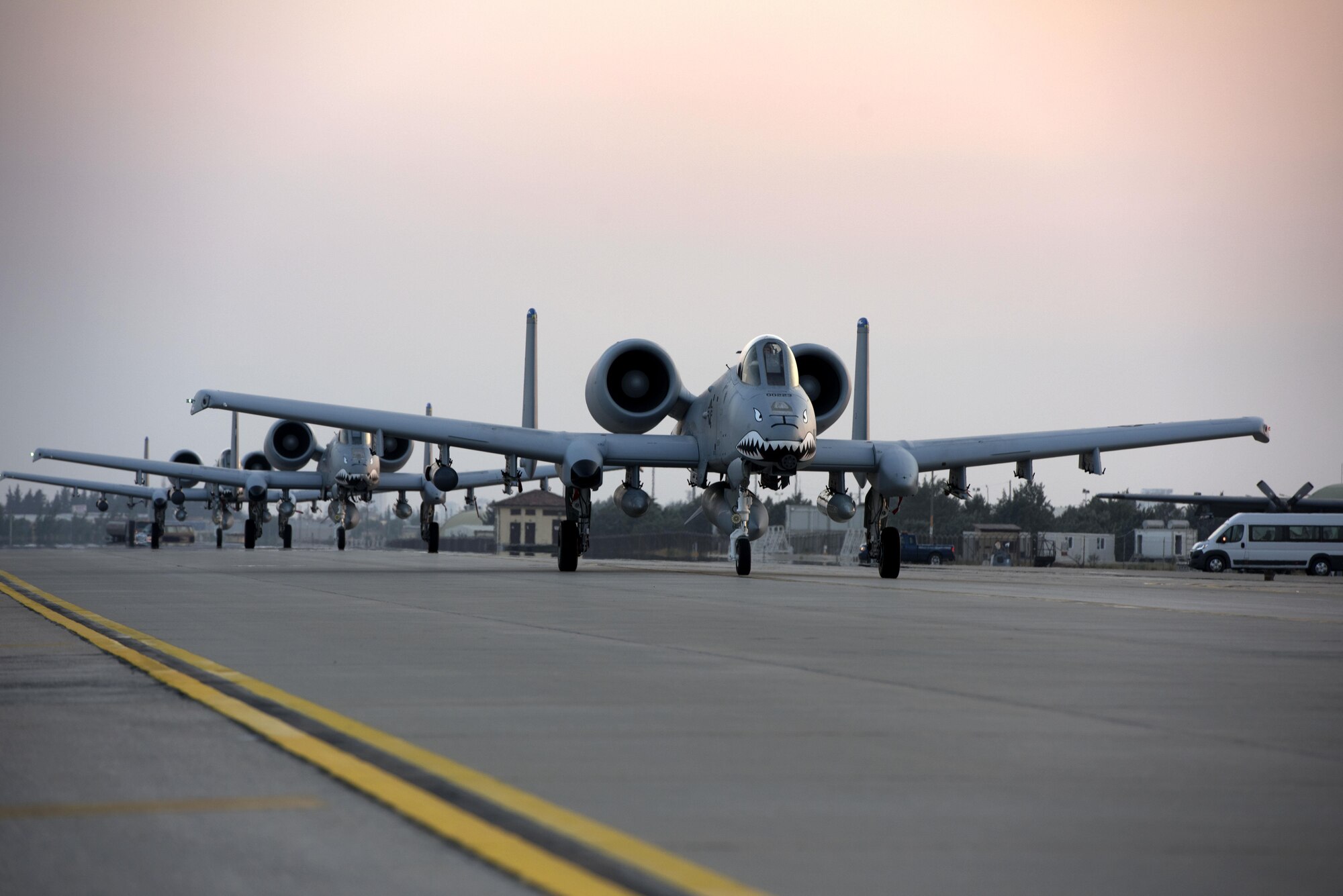 Three U.S. Air Force A-10 Thunderbolt IIs taxi along the flightline July 15, 2017, at Incirlik Air Base, Turkey. The A10s are deployed here from the 74th Fighter Squadron, Moody Air Force Base, Georgia, in support of Operation Inherent Resolve (U.S. Air Force photo by Airman 1st Class Kristan Campbell)