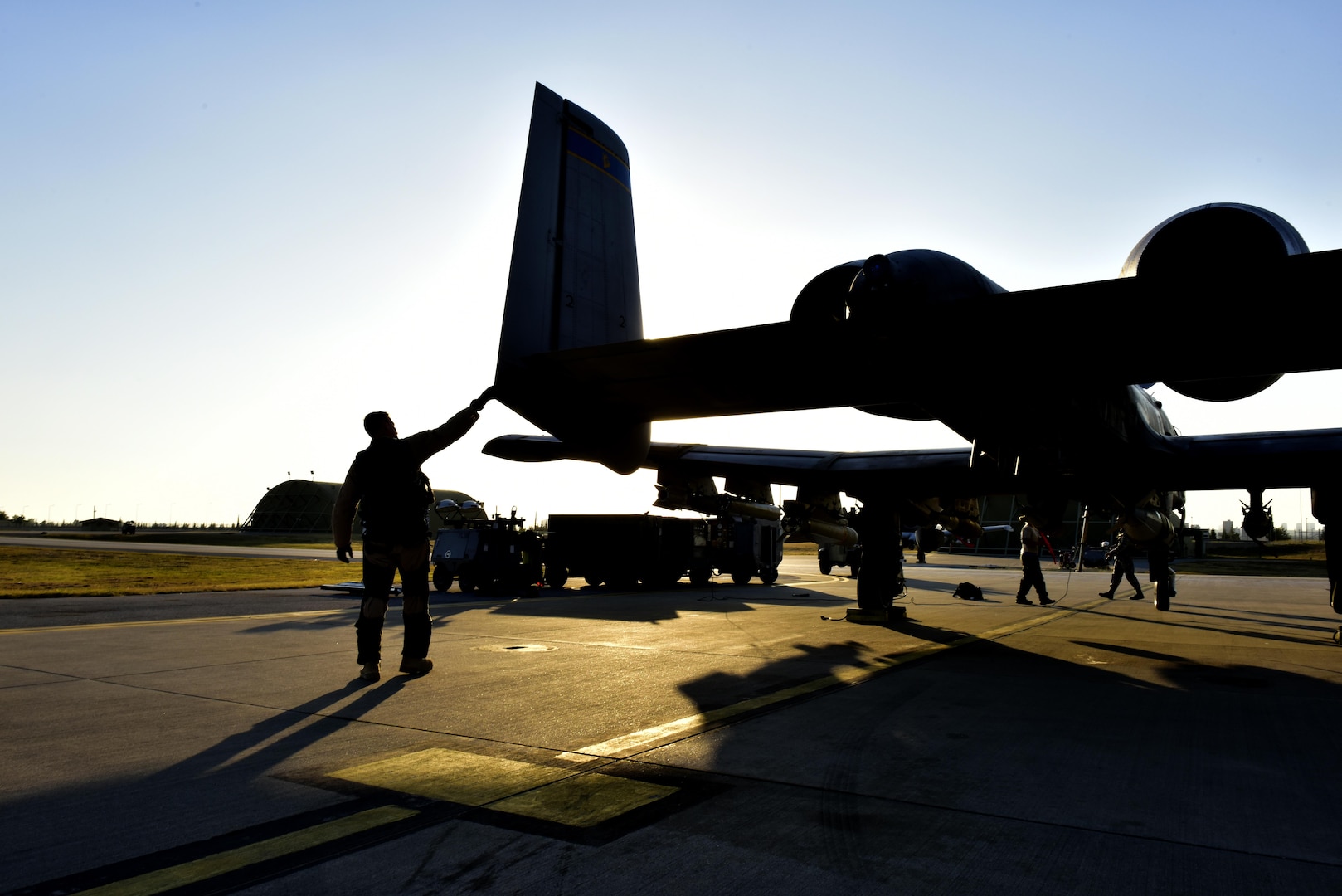 Lt. Col. Ben Rudolphi, 407th Expeditionary Operation Support Squadron commander, conducts a preflight check on an A-10 Thunderbolt II July 11, 2017, at Incirlik Air Base, Turkey. Rudolphi has provided a dual role in Operation INHERENT RESOLVE as the commander of the 407th EOSS in Southwest Asia and being directly in the fight against ISIS conducting A-10 flying missions with the 447th Air Expeditionary Group.The A-10 supports ground forces with rapid employment close air and contact support. It utilizes a variety of bomb, missiles and a 30mm GAU-8 seven-barrel Gatling gun. (U.S. Air Force photo by Senior Airman Ramon A. Adelan)