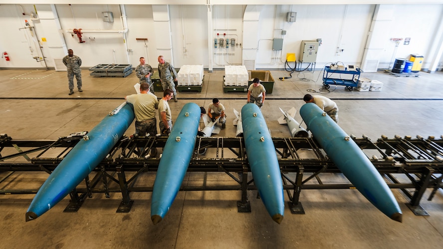 Airmen from the 5th Munitions Squadron build inert GBU-31 bombs at Minot Air Force Base, N.D., July 11, 2017. After the build, Chief Master Sgt. Alan Boling, Eighth Air Force command chief, spoke with 5 MUNS Airmen about the critical role of front-line supervisors in Air Force Global Strike Command’s deterrence mission. (U.S. Air Force photo/Senior Airman J.T. Armstrong)