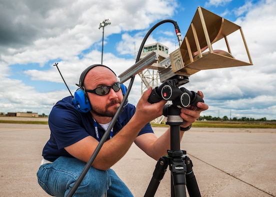 Rein Haas, 16th Electronic Warfare Squadron test engineer, directs a horn antenna during Combat Shield at Minot Air Force Base, N.D., July 12, 2017. The antenna is used for transmitting radio frequencies that are received and analyzed by the electronic warfare officer inside an aircraft. (U.S. Air Force photo/Senior Airman J.T. Armstrong)