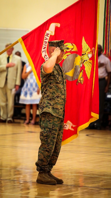 Col. Peter D. Buck is honored during a change of command ceremony aboard Marine Corps Air Station Beaufort, July 7. During the ceremony, Buck transferred responsibility of commanding officer of MCAS Beaufort to Col. Timothy P Miller. Miller, recently served at U.S. Pacific Command as the Warfighting Exercises Branch Chief. Buck, who assumed command on Feb. 13, 2014, is retiring from the Marine Corps after 30 years of dedicated service.