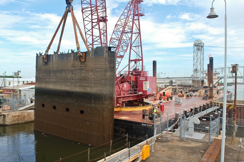 The Rock Island District’s Quad Cities crane took care of the heavy lifting and their M/V Bettendorf helped keep everything steady during the delicate maneuver.