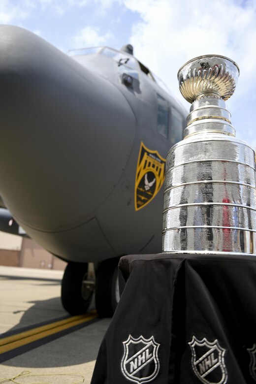The Stanley Cup sits in front of a C-130 Hercules at the Pittsburgh International Airport Air Reserve Station, Pa., July 12, 2017. Bill Guerin, assistant general manager of the Pittsburgh Penguins and former Penguins player, brought the cup on base in celebration of the Penguins’ 2017 Stanley Cup Championship win. (U.S. Air Force photo by Senior Airman Beth Kobily)