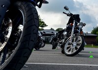 Motorcycles await their riders during a motorcycle safety course July 14, 2017, here. The course provides the skills and knowledge necessary for both amateur and veteran riders to stay safe while on the road. (U.S. Air Force Photo/Senior Airman Jeffrey Grossi)