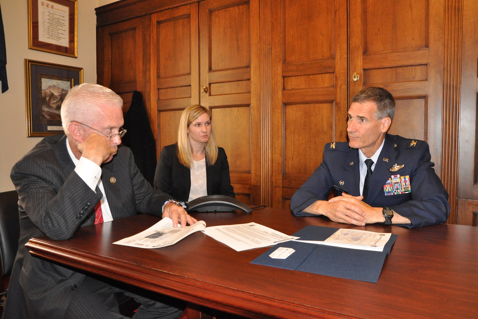 Air Force Reserve 910th Airlift Wing Commander Col. Dan Sarachene (right), based at Youngstown Air Reserve Station (YARS), Ohio, talks with Congressman Bill Johnson, Ohio’s Sixth district (left), as one of the congressman’s staffers looks on during a meeting on Capitol Hill here, June 29, 2017. Sarachene visited with the congressman and his staffer to discuss the 910th’s mission as well as several issues concerning the unit and installation as part of the commander’s Air Force Reserve Capitol Hill Program. The primary purpose of the program is to assist commanders in improving and building on relationships established with Congressional delegations and to increase their unit’s visibility with members of Congress. (U.S. Air Force photo/Master Sgt. Bob Barko Jr.)