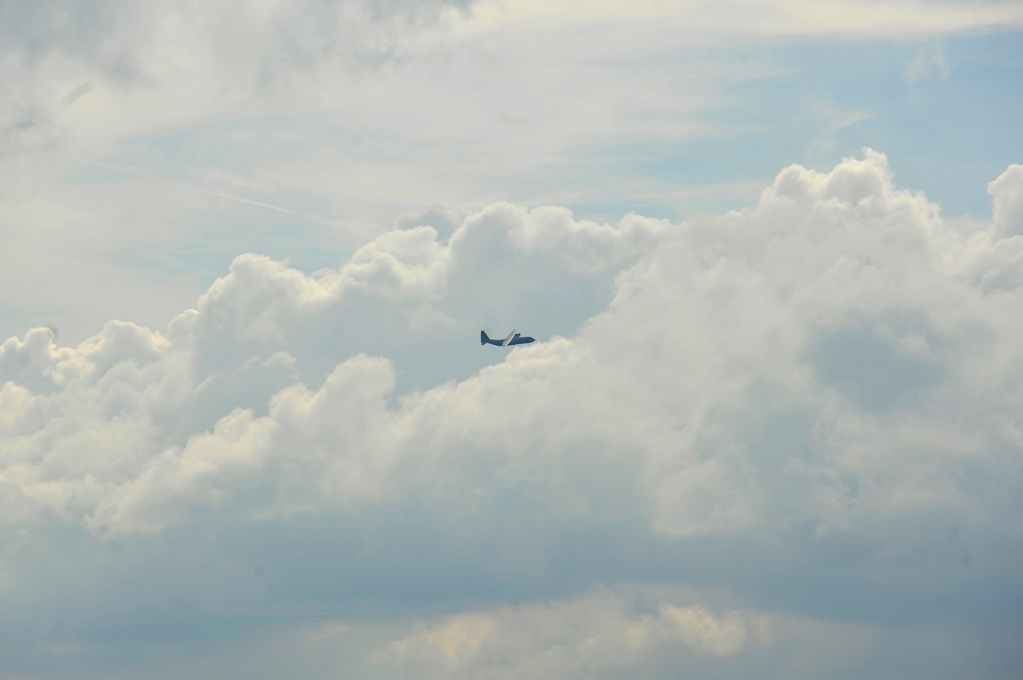 A C-130J Super Hercules assigned to the 37th Airlift Squadron, flies around after a drop at International Jump Week in Bitburg, Germany, July 11, 2017. The intended goal for International Jump Week is to get partner nations coordinated in techniques, parachutes, and other ways of dropping paratroopers. (U.S. Air Force photo by Airman 1st Class D. Blake Browning)