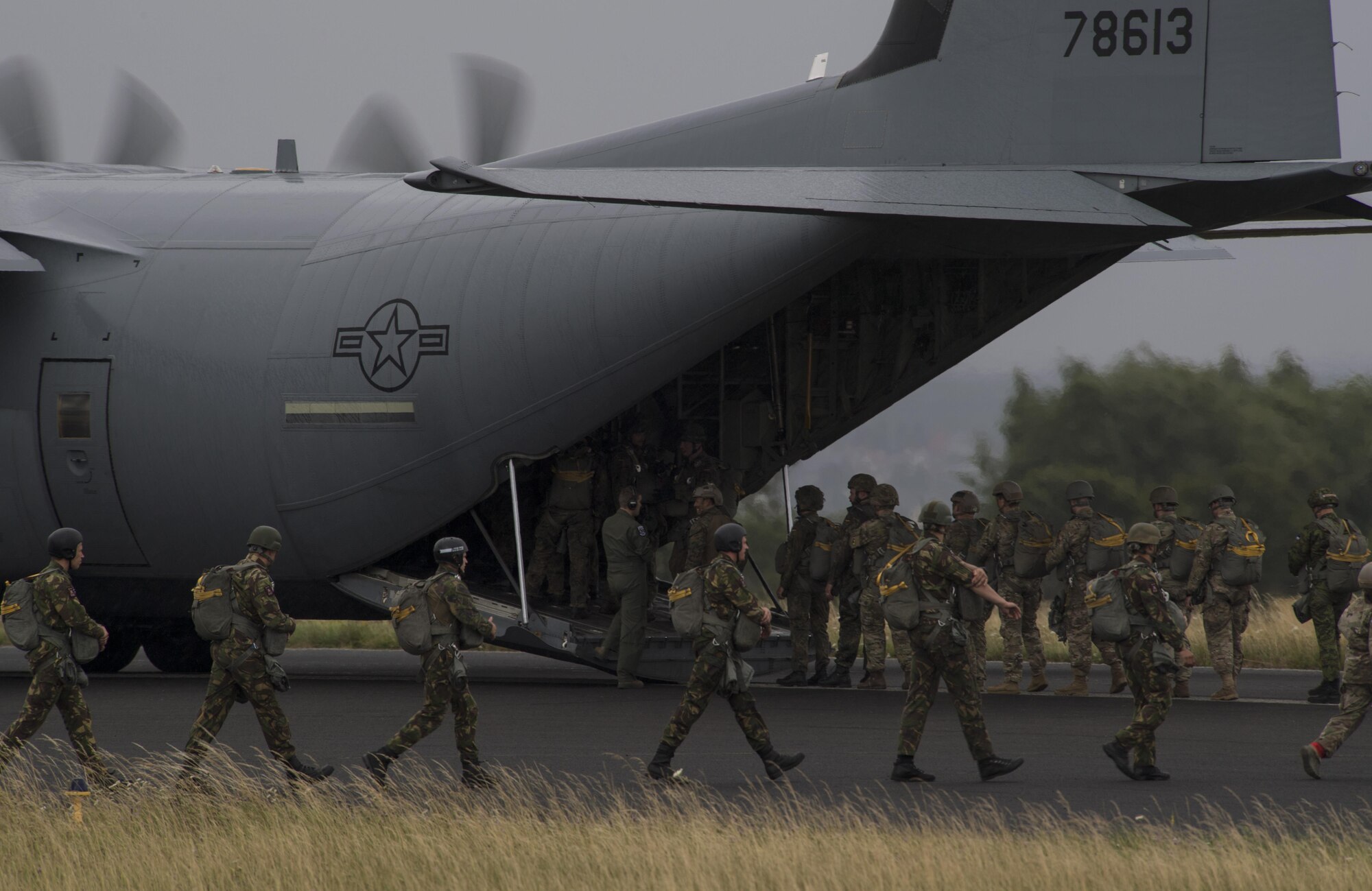 Parachutists load onto a C-130J Super Hercules assigned to the 37th Airlift Squadron for takeoff during International Jump Week in Bitburg, Germany, July 11, 2017. Inside Spangdahlem Air Base’s airspace, the Bitburg drop zone required a lot of coordination between the 435th Contingency Response Group and Airmen assigned to the 37th Airlift Squadron. (U.S. Air Force photo by Senior Airman Tryphena Mayhugh)