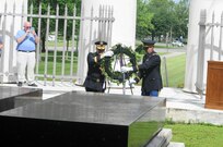 Brigadier General Stephen E. Strand, left, deputy commanding general for the U.S. Army Reserve's 88th Regional Support Command, and Chaplain (Capt.) Timothy Wilmetti, chaplain for the 489th Civil Affairs Battalion, place a wreath at the base of former President Warren G. Harding's tomb to honor the 29th President of the United States during a ceremony in Marion, Ohio, July 15.