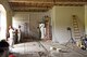 Members of the 219th Rapid Engineer Deployable Heavy Operational Repair Squadron Engineer hang a light over the newly built room to insulate a water tank, June 14, 2017, Bile Barn site Pocek base, near Postonja, Slovenia. The Bile barn was used in 1581 to house the Lipizzaner stallions and today will be used as range control for American forces a couple times a year. (U.S. Air National Guard photo/Staff Sgt. Lindsey Soulsby)