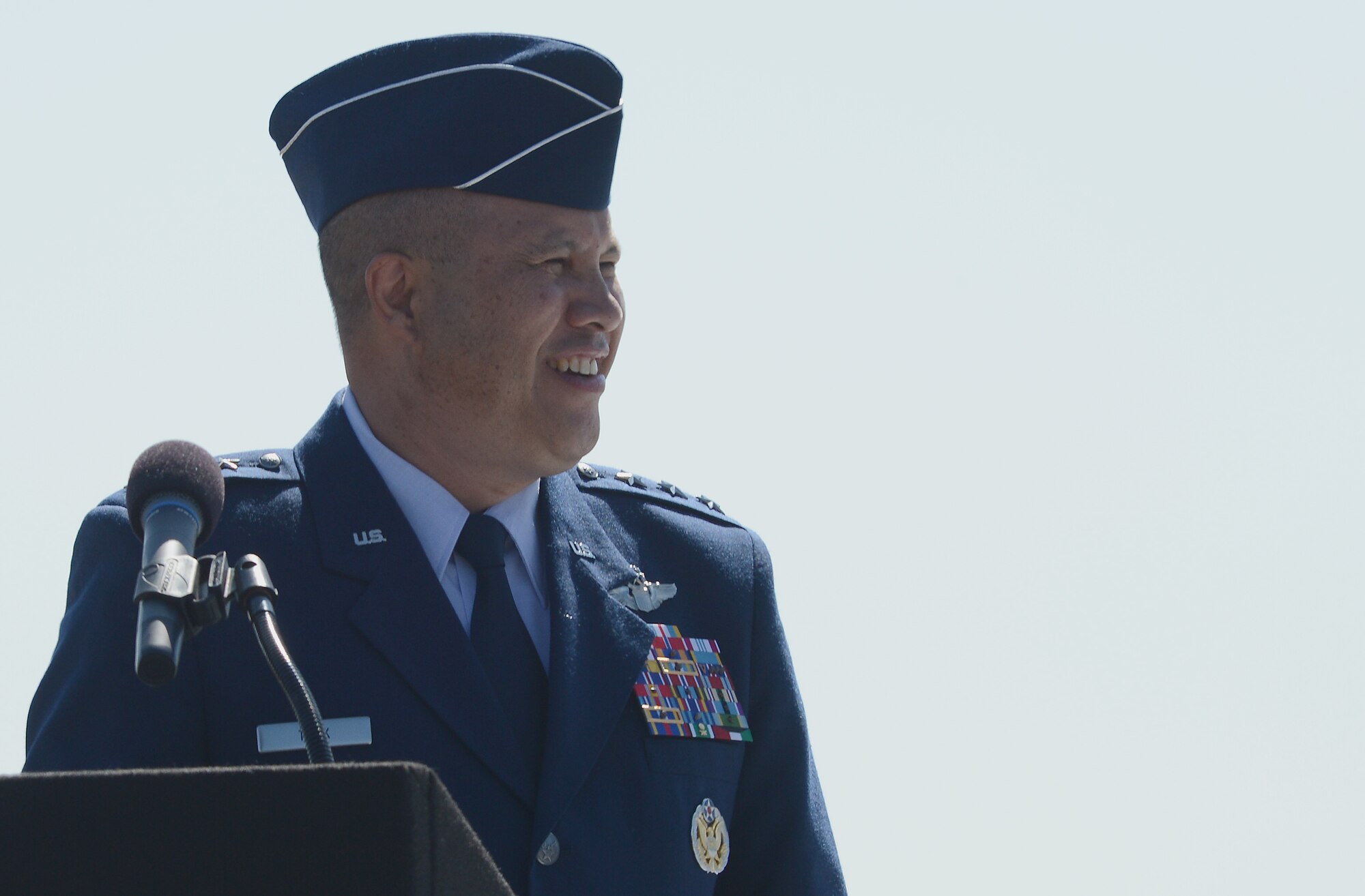 Lt. Gen. Giovanni Tuck, 18th Air Force commander, addresses the audience during a change of command ceremony, July 14, 2017 at Joint Base Lewis-McChord, Wash. As 18th AF commander, Tuck is responsible for the command's worldwide operational mission of providing rapid global mobility and sustainment for America's armed forces through airlift, aerial refueling, aeromedical evacuation and contingency response. (U.S. Air Force photo/Staff Sgt. Divine Cox)