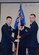 Lt. Col. Christopher Carnduff, right, incoming 628th Civil Engineering Squadron commander, takes command during a change of command ceremony officiated by Col. Rockie Wilson, left, 628th Mission Support Group commander, at the Charleston Club here, July 6. Carnduff replaced Lt. Col. Matthew Brennan as the 628th Civil Engineering Squadron commander.  