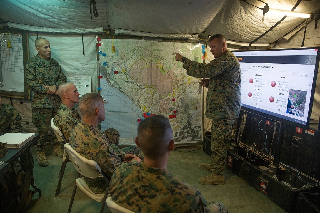 U.S. Marine Corps Lt. Col. Chad Dodd addresses Marines on exercise Pacific Horizon 2017 on Camp Pendleton, Calif., July 8, 2017. Pacific Horizon 2017 is a Maritime Prepositioning Force (MPF) exercise designed to train I Marine Expeditionary Force (MEF) and components of Naval Beach Group 1 (NBG-1) Marines and Sailors on arrival and assembly operation as well as follow-on Marine Air Ground Task Force actions to ensure that the right equipment, supplies and tools get to the right people to be employed in a crisis response, humanitarian assistance or amassing combat power ashore from sea. (U.S. Marnie Corps photo by Lance Cpl. Roxanna Gonzalez)