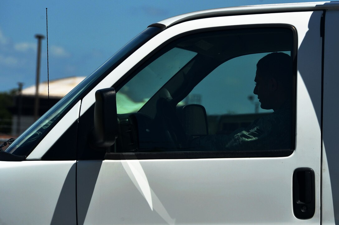 U.S. Air Force Airman 1st Class Alejandro Ponce, 20th Logistics Readiness Squadron (LRS) ground transportation journeyman, delivers outgoing packages at Shaw Air Force Base, S.C., July 13, 2017. Airmen assigned to the 20th LRS ground transportation flight work alongside inbound and outbound cargo Airmen in an effort to increase the timeliness of packages delivered across base and to off-base tenant units. (U.S. Air Force photo by Senior Airman Christopher Maldonado)