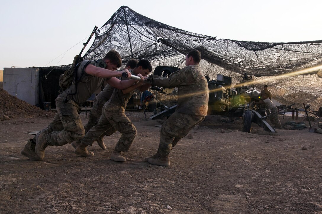 Paratroopers rotate a howitzer in preparation to engage ISIS militants with precise and strategically placed artillery fire in support of Iraqi and Peshmerga fighters in Mosul, Iraq. July 6, 2017. Army photo by Sgt. Christopher Bigelow