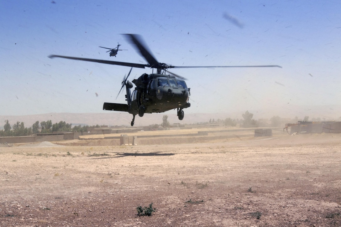 UH-60 Black Hawks deliver munitions to Army paratroopers at Forward Operating Base Shalalot, Iraq, July 6, 2017.  Army photo by Sgt. Christopher Bigelow