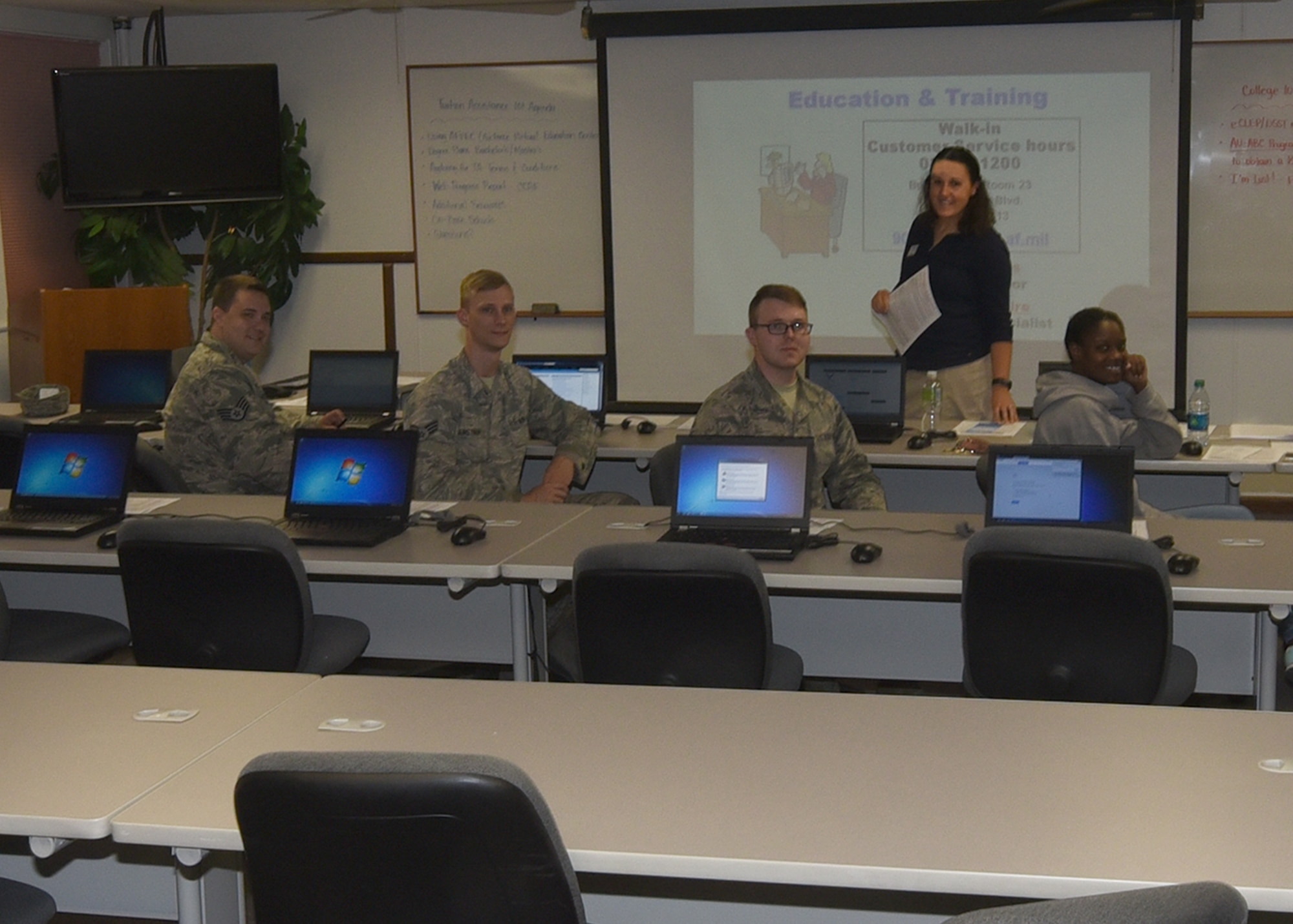 Members of the Mighty Ninety attend a tuition assistance briefing hosted by Coryn Davis, Community College of the Air Force advisor at F.E. Warren Air Force Base, Wyo., July 13, 2017. The briefing is just one resource that is available when you visit the Education and Training Center. (U.S. Air Force photo by Terry Higgins) 