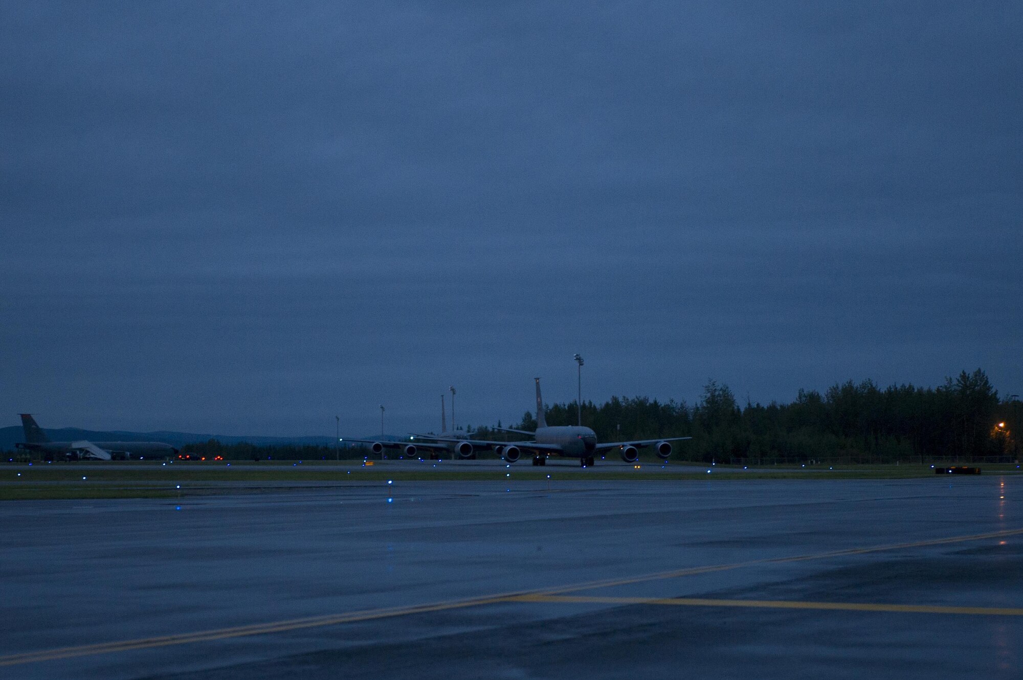 Two U.S. Air Force KC-135 Stratotanker aircraft taxi toward the runway July 12, 2017, at Eielson Air Force Base, Alaska. These are two of four aircraft which departed Eielson for exercise ULTIMATE REACH. (U.S. Air Force photo by Airman Eric M. Fisher)