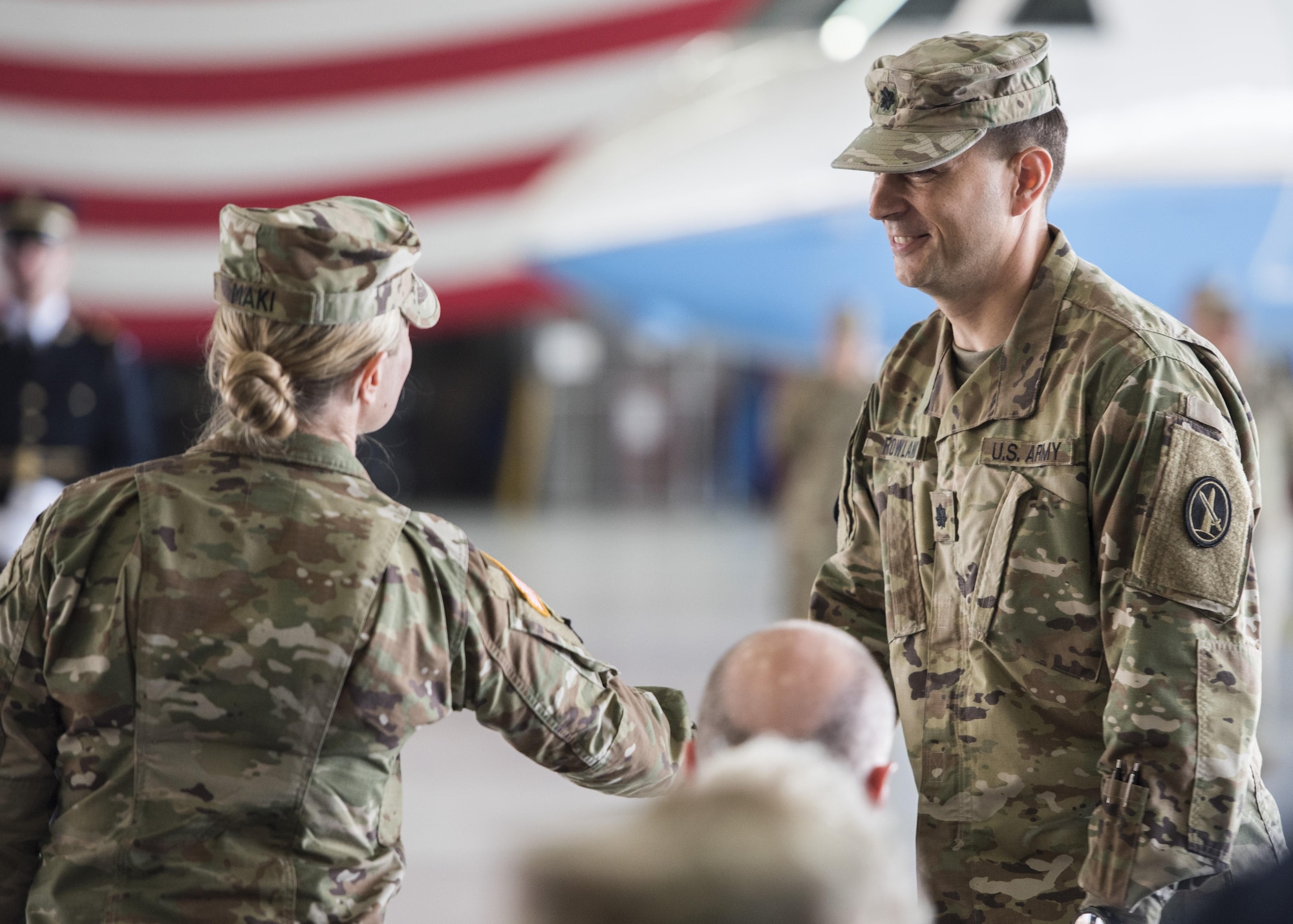 Lt. Col. Heather L. Maki, left, former U.S. Army Priority Air Transport Command commander, welcomes Lt. Col. Matthew L. Rowland, right, incoming USAPAT commander, during the unit’s change of command and responsibility ceremony at Joint Base Andrews, Md., July 14, 2017. USAPAT’s mission is to provide senior Army leadership and key government officials with fast, long-range and professional executive transportation throughout the world. Change of command ceremonies are symbolic of the transfer of command responsibility and the lasting continuity of the unit’s mission. (U.S. Air Force photo by Senior Airman Jordyn Fetter)