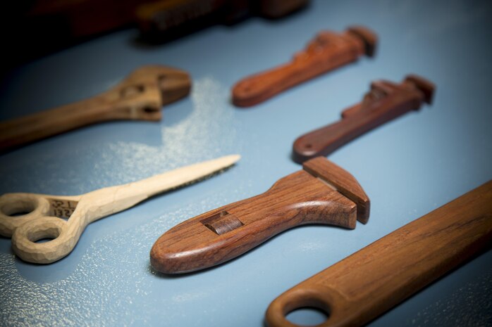 Some of the hand tools Jell Iller has carved. Some are carved from multiple pieces of wood, and some are carved from a single piece of wook