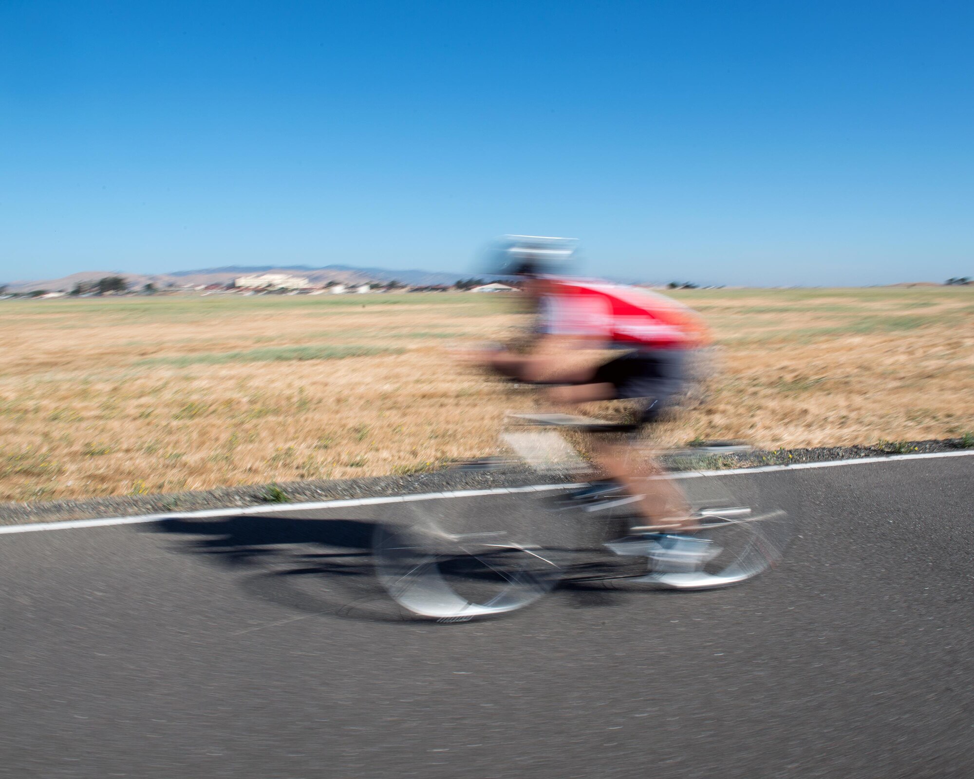 Members from Travis Air Force Base, Calif., participate in the Travis Triathlon, July 15, 2017. Over 25 participants competed in the triathlon which consisted of a 400 meter swim, 12 mile bike ride and a 5K run. (U.S. Air Force photo by Louis Briscese)