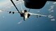 A KC-10 Extender from Travis Air Force Base, California, refuels a U.S. Navy F/A-18 Super Hornet over the Pacific Ocean July 14, 2017. KC-10s from Travis AFB supported Exercise Talisman Saber 2017 by conducting various air refueling missions over Australia. TS17 is a biennial exercise in Australia that focuses on bilateral military training between U.S. Pacific Command forces and the Australian Defence Force to improve U.S.-Australia combat readiness, increase interoperability, maximize combined training opportunities and conduct maritime prepositioning and logistics operations in the Pacific. (U.S. Air Force photo by 2nd Lt. Sarah Johnson)