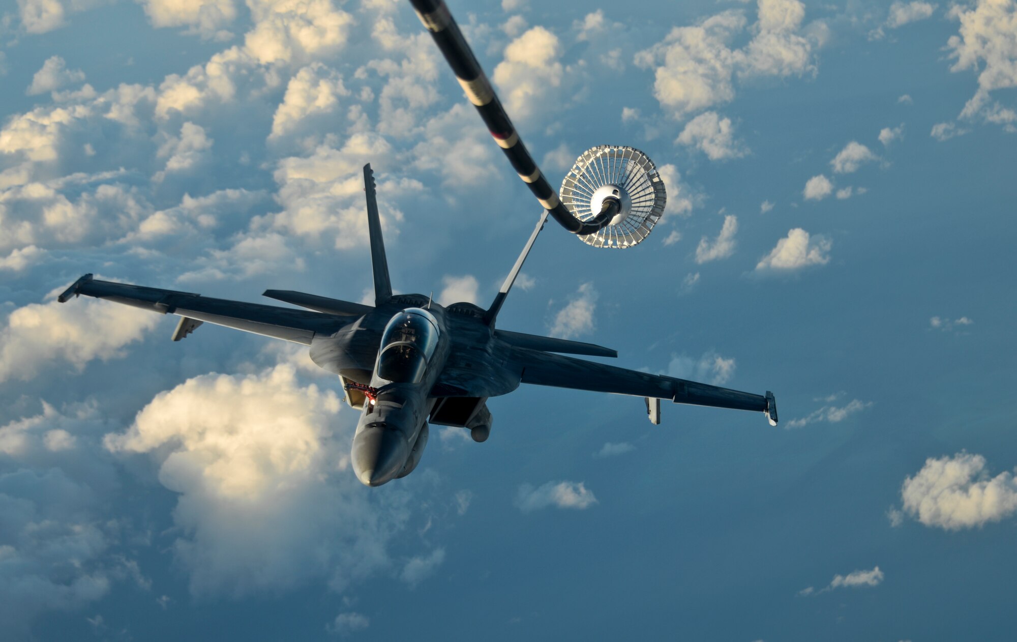 A KC-10 Extender from Travis Air Force Base, California, prepares to refuel another KC-10 over the Pacific Ocean July 14, 2017. KC-10s from Travis AFB supported Exercise Talisman Saber 2017 by conducting various air refueling missions over Australia. TS17 is a biennial exercise in Australia that focuses on bilateral military training between U.S. Pacific Command forces and the Australian Defence Force to improve U.S.-Australia combat readiness, increase interoperability, maximize combined training opportunities and conduct maritime prepositioning and logistics operations in the Pacific. (U.S. Air Force photo by 2nd Lt. Sarah Johnson)