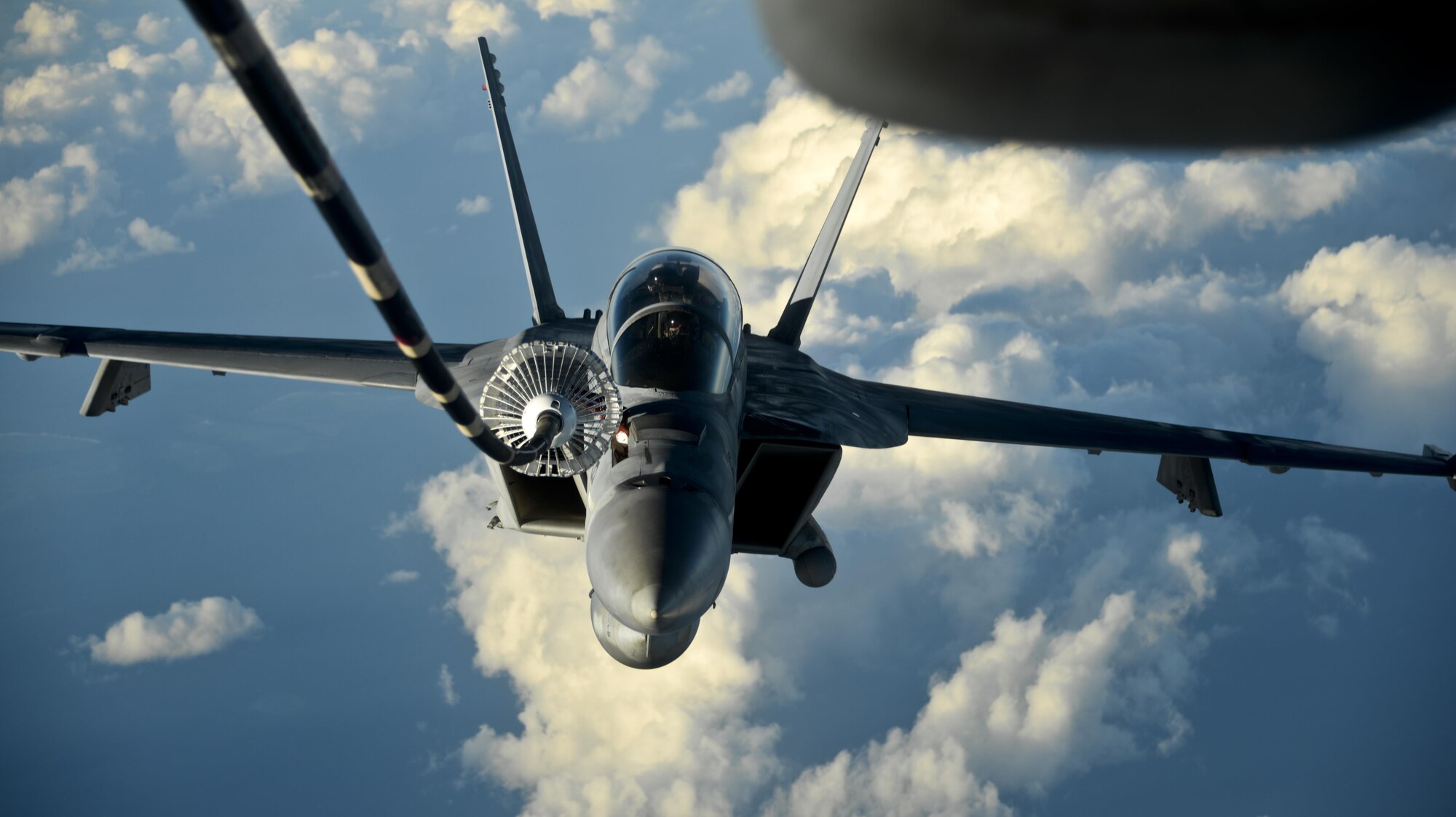 A KC-10 Extender from Travis Air Force Base, California, prepares to refuel another KC-10 over the Pacific Ocean July 14, 2017. KC-10s from Travis AFB supported Exercise Talisman Saber 2017 by conducting various air refueling missions over Australia. TS17 is a biennial exercise in Australia that focuses on bilateral military training between U.S. Pacific Command forces and the Australian Defence Force to improve U.S.-Australia combat readiness, increase interoperability, maximize combined training opportunities and conduct maritime prepositioning and logistics operations in the Pacific. (U.S. Air Force photo by 2nd Lt. Sarah Johnson)