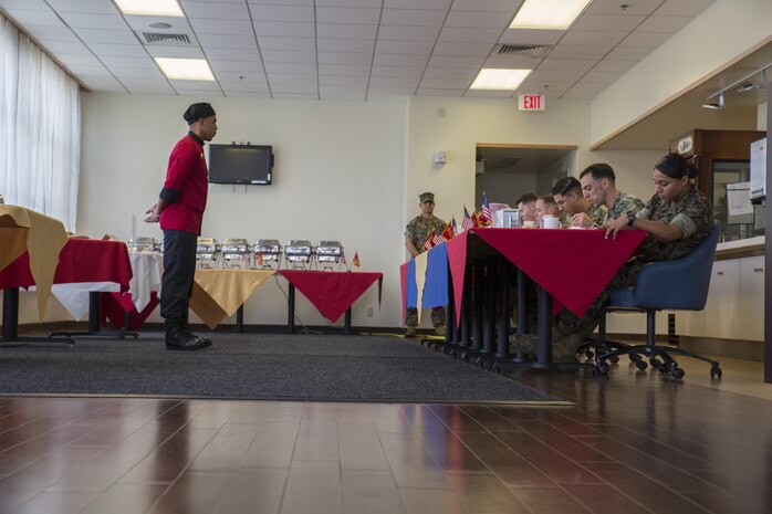 U.S. Marine Corps Cpl. Keyon Dummer Williams, a food service specialist with Headquarters and Headquarters Squadron, waits for the judges’ critique of his appetizer during the Food Service Specialist of the Quarter competition at Marine Corps Air Station Iwakuni, Japan, July 13, 2017. The event prepared Marines for a larger competition July 26-27 in Okinawa. Each chef made a three-course meal for the judges to eat and assess. Williams’ appetizer was a watermelon bite with goat cheese, bacon and basil garnish. (U.S. Marine Corps photo by Lance Cpl. Gabriela Garcia-Herrera)