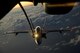 A U.S. Air Force KC-10 Extender from Travis Air Force Base, California, refuels a U.S. Navy F/A-18 Super Hornet over the Pacific Ocean July 14, 2017. KC-10s from Travis AFB supported Exercise Talisman Saber 2017 by conducting various air refueling missions over Australia. TS17 is a biennial exercise in Australia that focuses on bilateral military training between U.S. Pacific Command forces and the Australian Defence Force to improve U.S.-Australia combat readiness, increase interoperability, maximize combined training opportunities and conduct maritime prepositioning and logistics operations in the Pacific. (U.S. Air Force photo by 2nd Lt. Sarah Johnson)