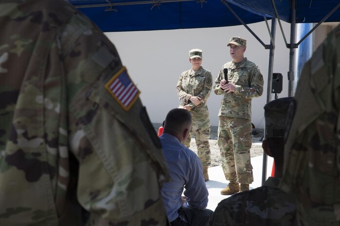 U.S. Army Lt. Col. Dwayne Bechtol, Public Health Activity Japan commanding officer, gives a speech during the opening of the veterinary clinic at Marine Corps Air Station (MCAS) Iwakuni, July 13, 2017. The new facility was built to accommodate the growing number of patients and military working dogs on the air station. The veterinary clinic is responsible for the welfare of hundreds of military pets and military working dogs. The new facility allows technicians to double the amount of patients they can see. (U.S. Marine Corps photo by Sgt. N.W. Huertas)