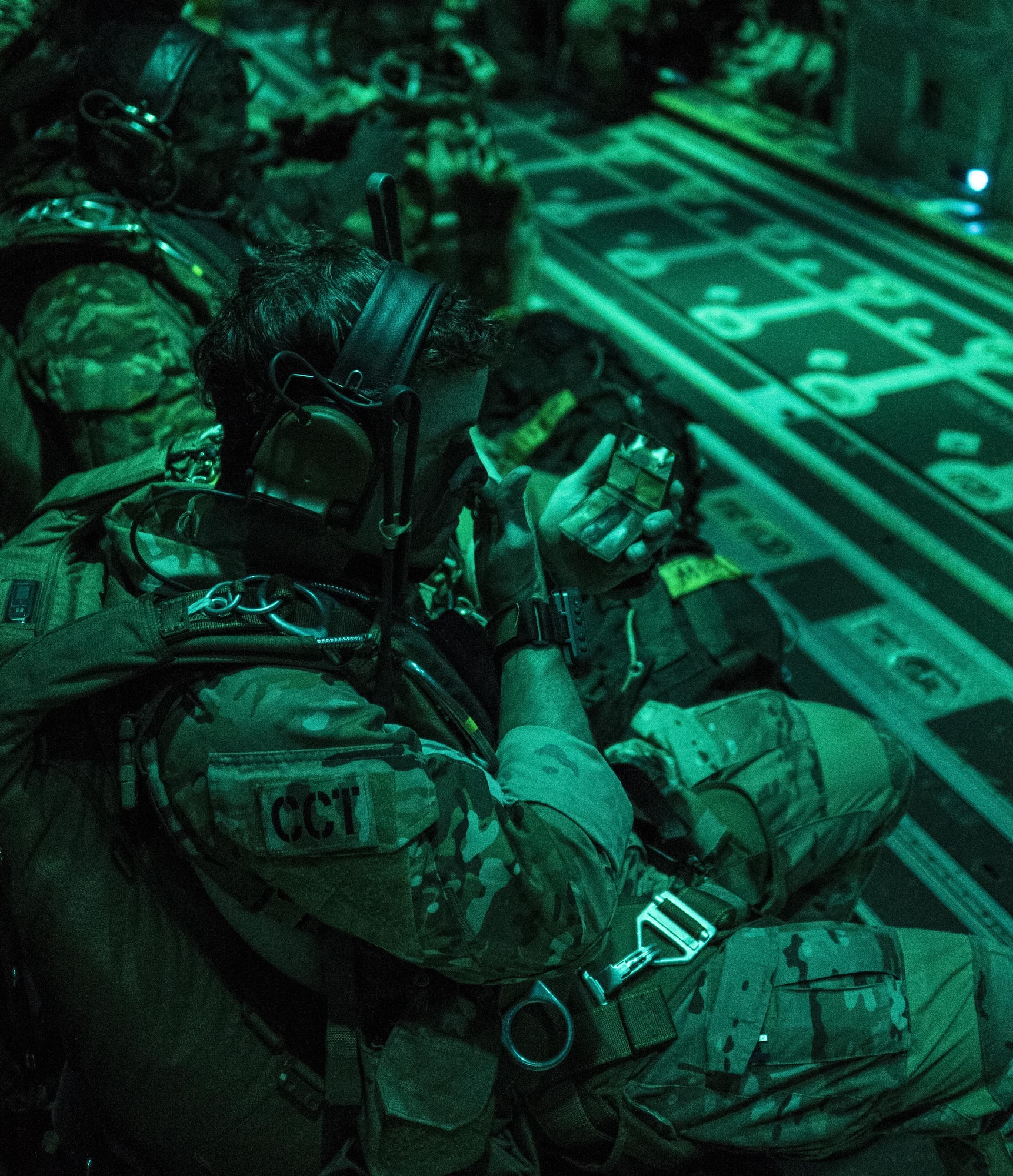 A U.S. Air Force 320th Special Tactics Squadron jumpmaster applies face paint prior to high altitude, high opening (HAHO) jump operations July 11, 2017, at Rockhampton, Australia during Talisman Saber 2017. The infiltration of 320th STS combat controllers and U.S. Marine Corps 3rd Reconnaissance Battalion operators served as the first stage to the exercise’s massive tactical (MASS TAC) airdrop of 500 jumpers over Shoalwater Training Area in Queensland, Australia. (U.S. Air Force photo by Capt. Jessica Tait)